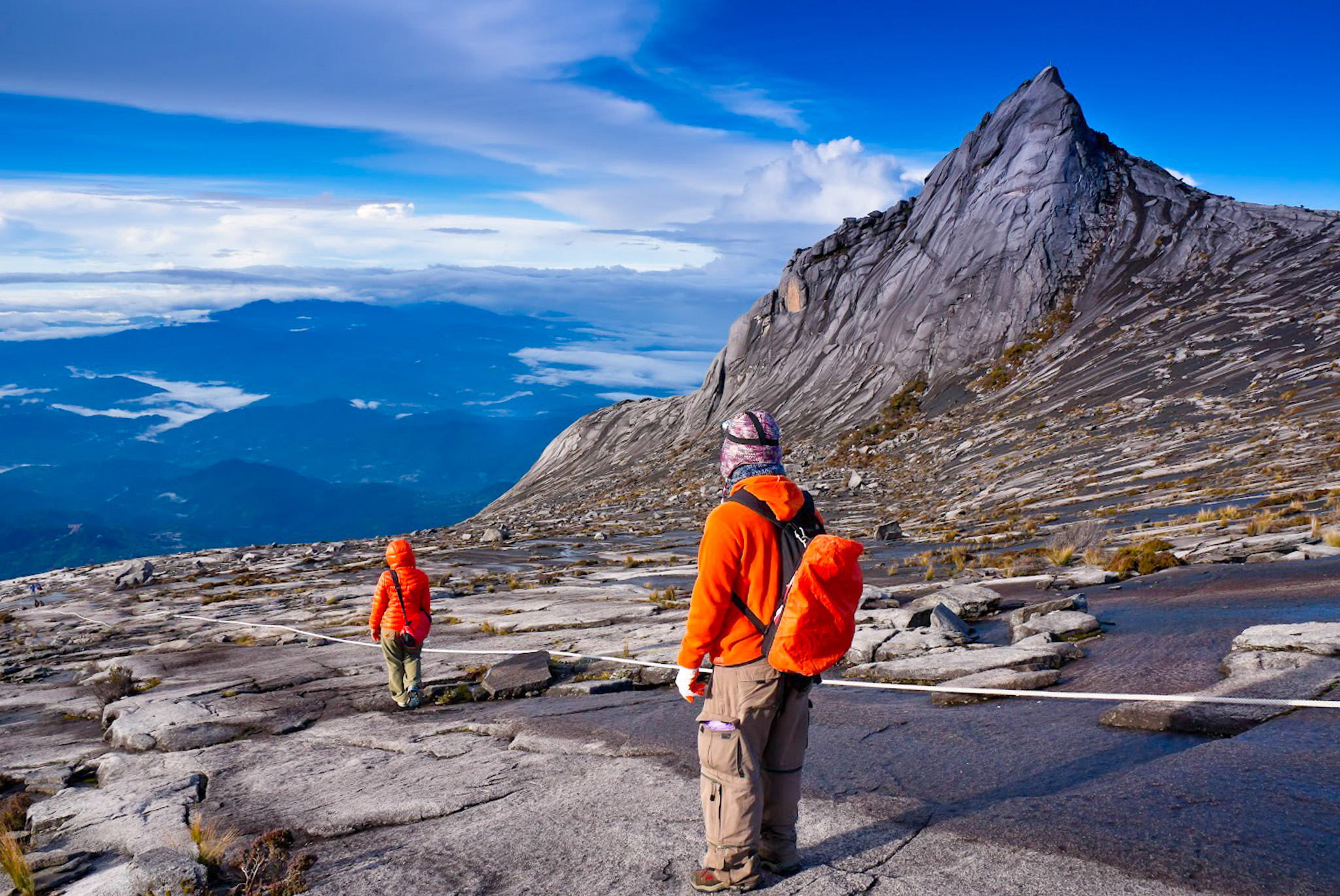 Tourists Hiking Down Kinabalu Mountain