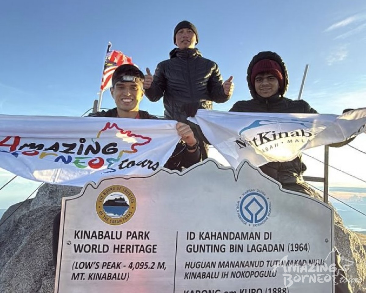 Earthquake Survivors Reach the Peak of Mount Kinabalu