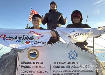 Earthquake Survivors Reach the Peak of Mount Kinabalu
